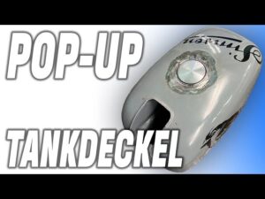 Pop-up fuel filler cap